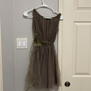 Brown lyrical dress with green ribbon